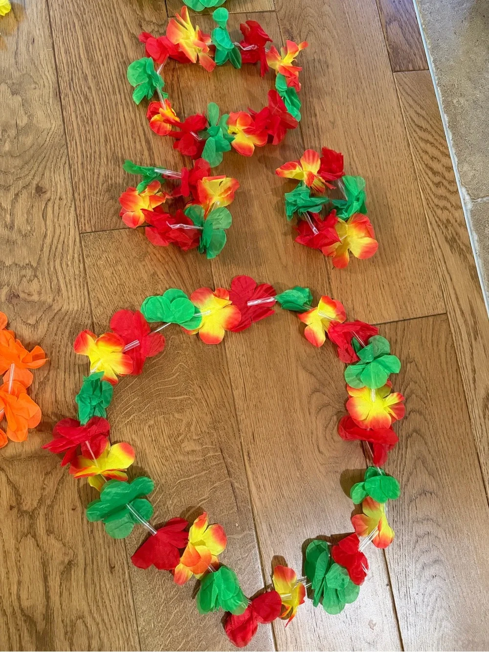 Kids Hawaiian Leis and grass skirts party favors